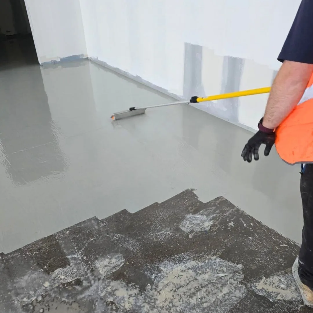 Epoxy Self Levelling Floor - Being Painted Down