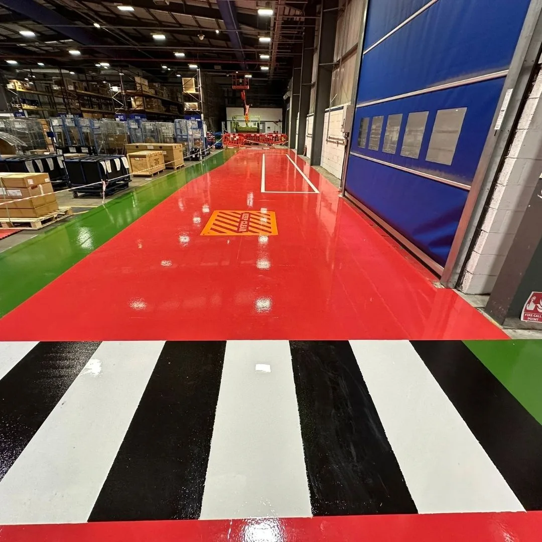 High Build Epoxy Coating - Green, Red, Black & White Line Marking for a Loading Dock High Build Epoxy Coating - Green, Red, Black & White Line Marking for a Loading Dock